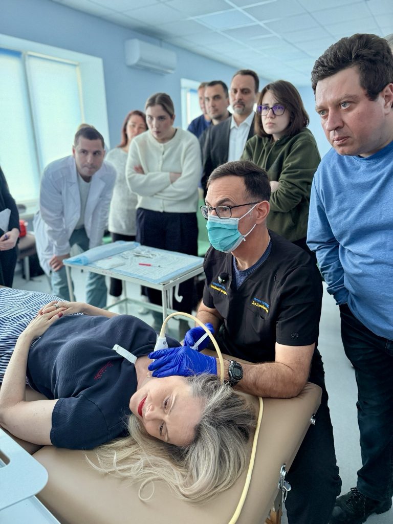 Clinicians watching a live ultrasound-guided SGB demonstration
